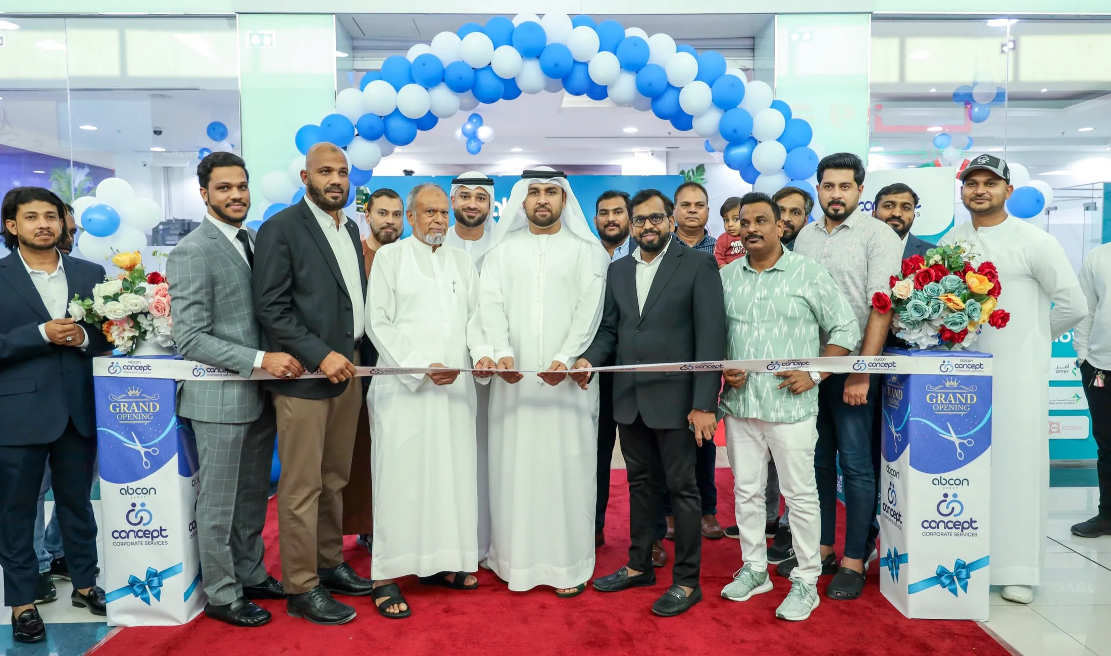Ribbon cutting at an Abcon Group inauguration with the team and guests