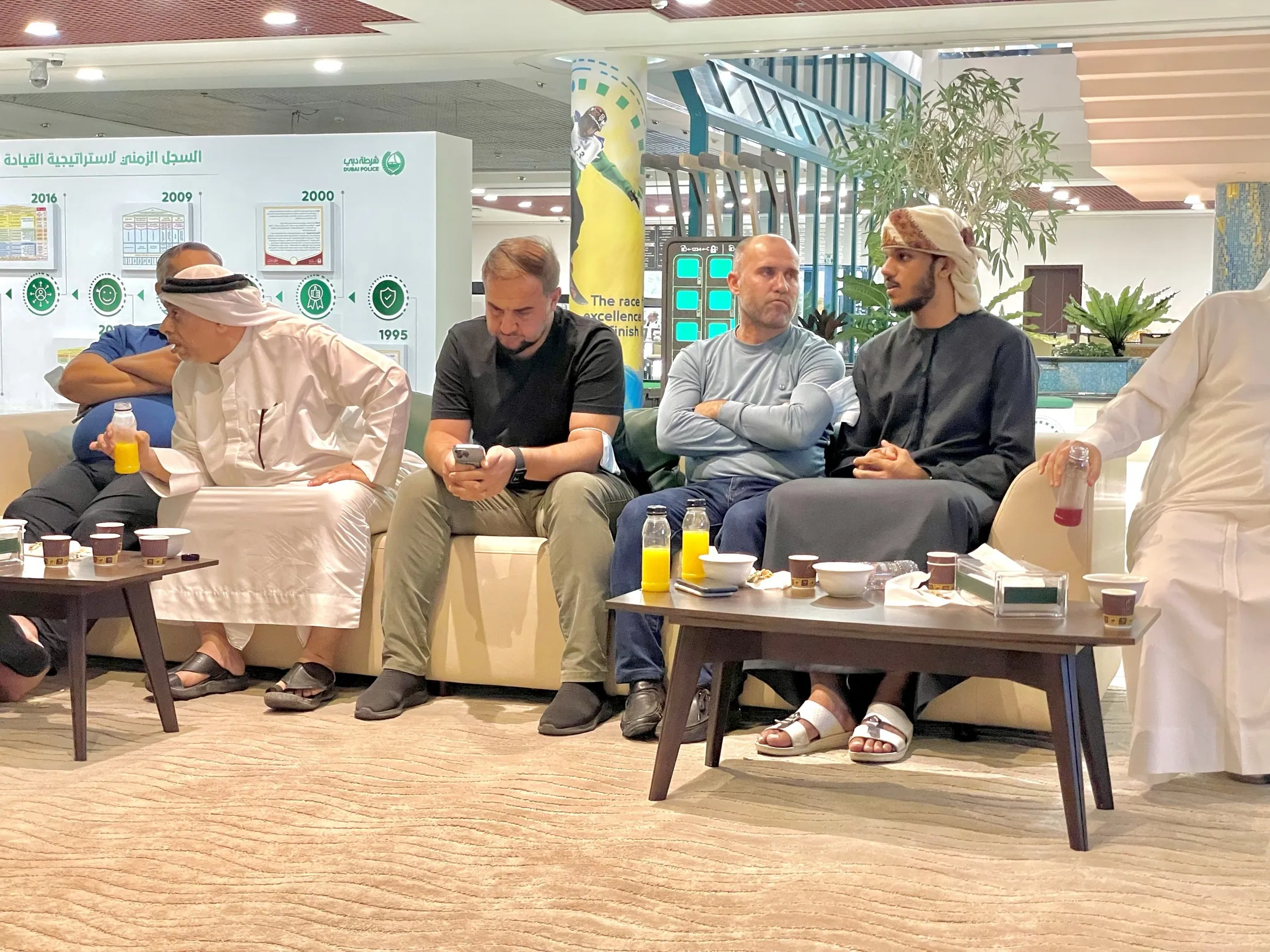 Guests seated together in a majlis at the Dubai Police Club