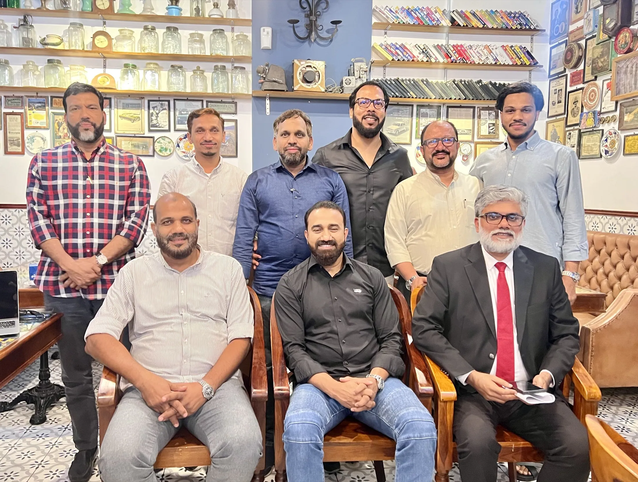 Muhammed Shafad with the Abcon Branding team in the office
